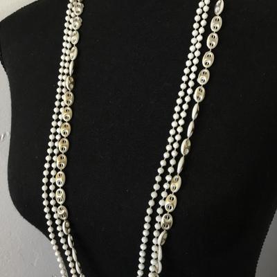 Beautiful, vintage white and gold tone Multi strand, bead, flapper style necklace