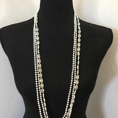 Beautiful, vintage white and gold tone Multi strand, bead, flapper style necklace