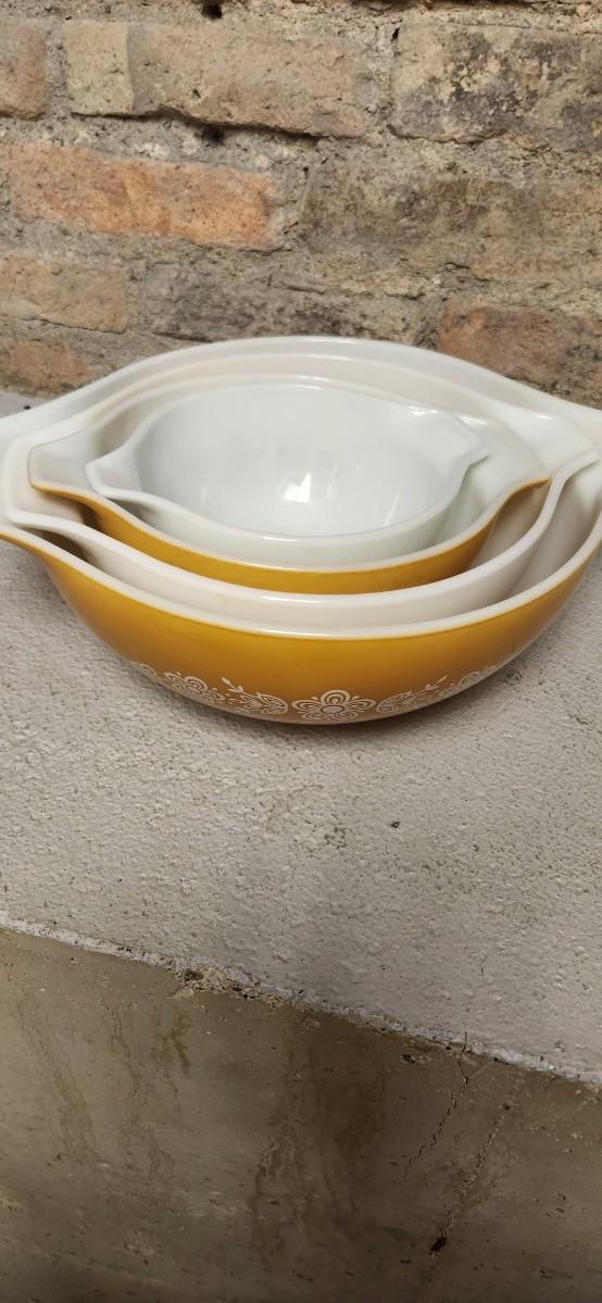 Sale Photo Thumbnail #5: Dishwasher damaged yellow 403 bowl. Note the damage. Butterfly gold Cinderella bowl set. Some damage on that 442 but it is a first generation.