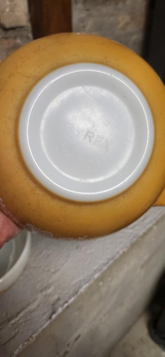 Sale Photo Thumbnail #13: Dishwasher damaged yellow 403 bowl. Note the damage. Butterfly gold Cinderella bowl set. Some damage on that 442 but it is a first generation.