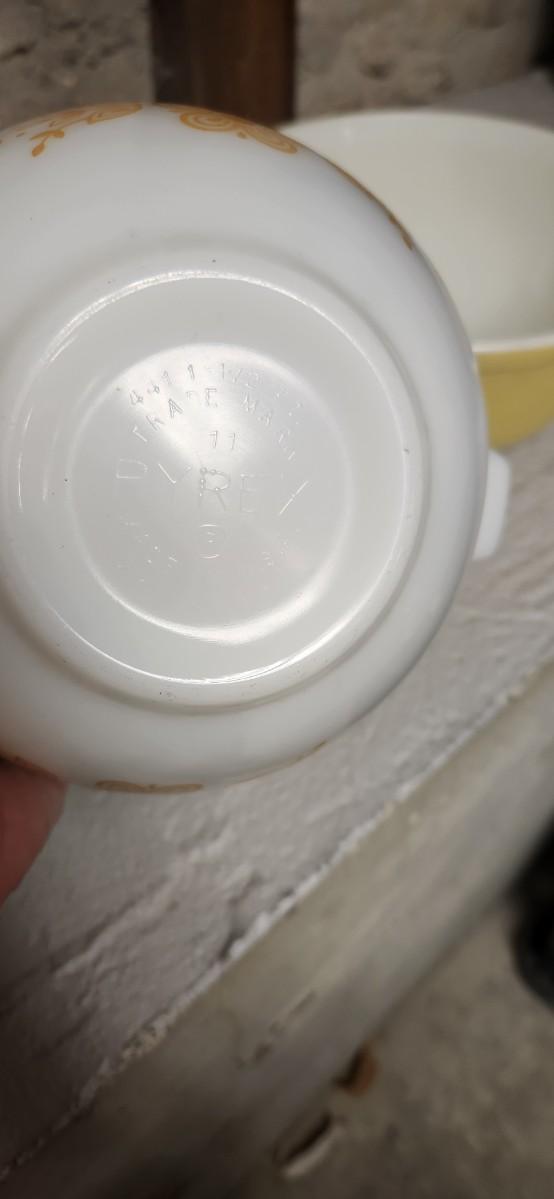 Sale Photo Thumbnail #14: Dishwasher damaged yellow 403 bowl. Note the damage. Butterfly gold Cinderella bowl set. Some damage on that 442 but it is a first generation.