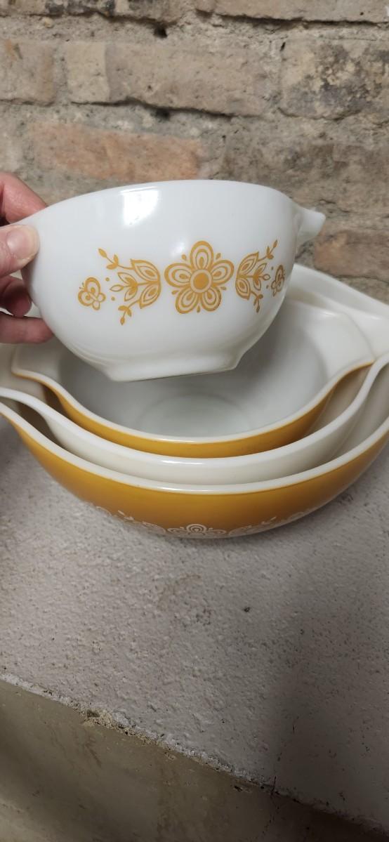 Sale Photo Thumbnail #6: Dishwasher damaged yellow 403 bowl. Note the damage. Butterfly gold Cinderella bowl set. Some damage on that 442 but it is a first generation.