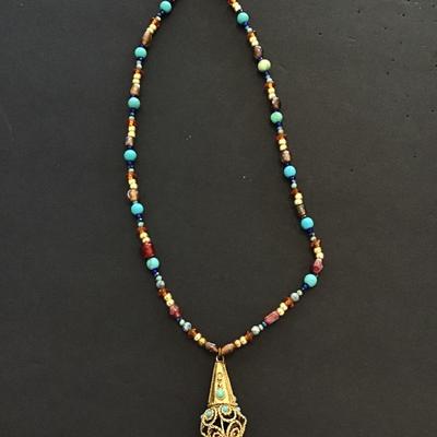 Sale Photo Thumbnail #50: Very nice vintage ethnic multicolored stone necklace. Please see attached photos.