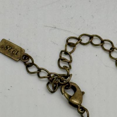 Sale Photo Thumbnail #431: With teardrop-shape translucent jewels.  Good condition.