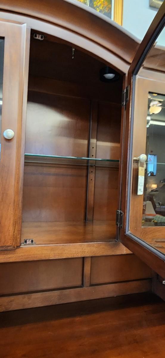Sale Photo Thumbnail #18: Gorgeous Richardson Bros China Hutch. Beveled glass in the doors, plate rail on the glass shelves, 2 lights. Purchased at Home furniture. 2 pieces but bring help to load!!