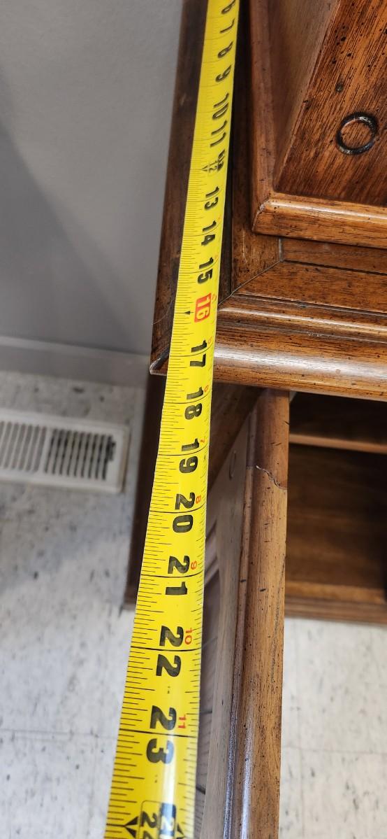 Sale Photo Thumbnail #38: Solid wood china hutch with a single light and single glass shelf in the top piece. 2 pieces but bring help to load