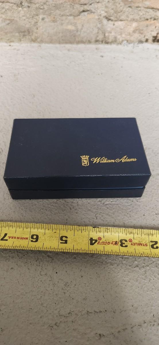 Sale Photo Thumbnail #55: Beautiful set of 4 cobalt glass shakers with silver casing and tops. Still have the original box