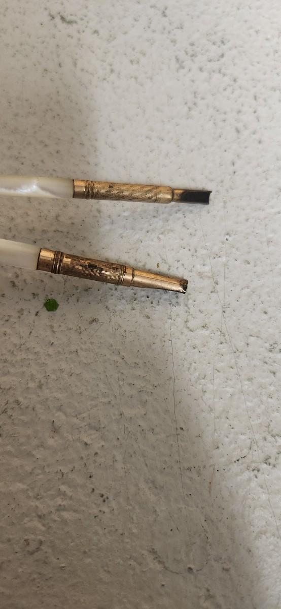 Sale Photo Thumbnail #135: Pair of ladies writing pens that are mother of pearl and gold. MoP letter opener with silver handle.