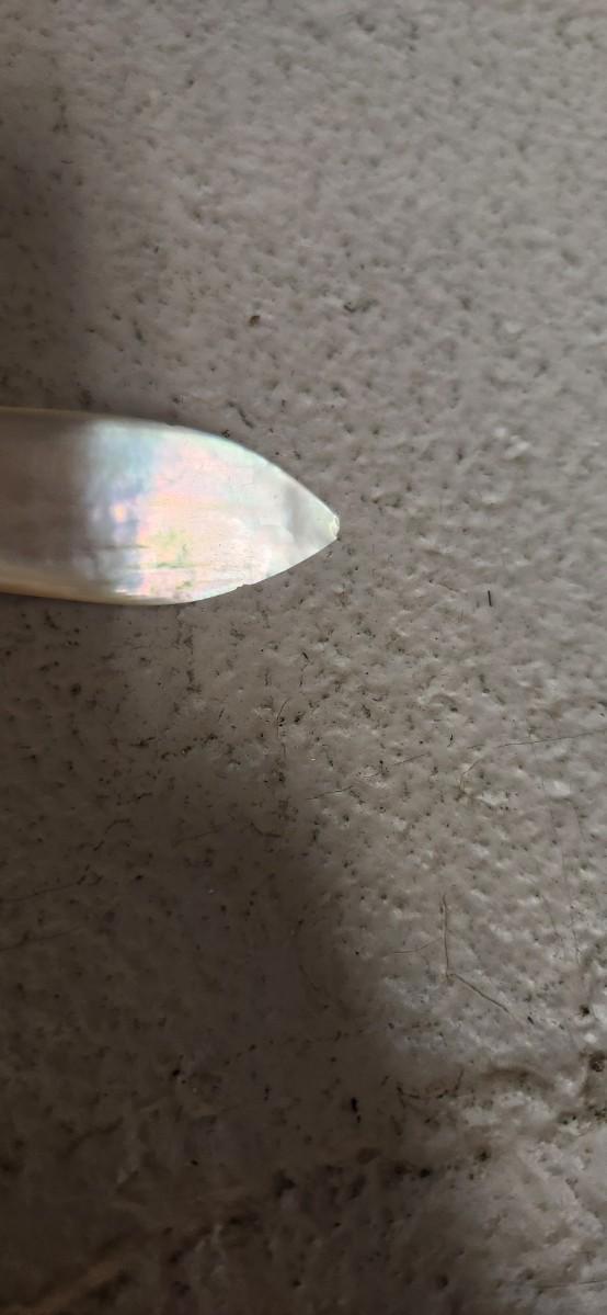 Sale Photo Thumbnail #134: Pair of ladies writing pens that are mother of pearl and gold. MoP letter opener with silver handle.