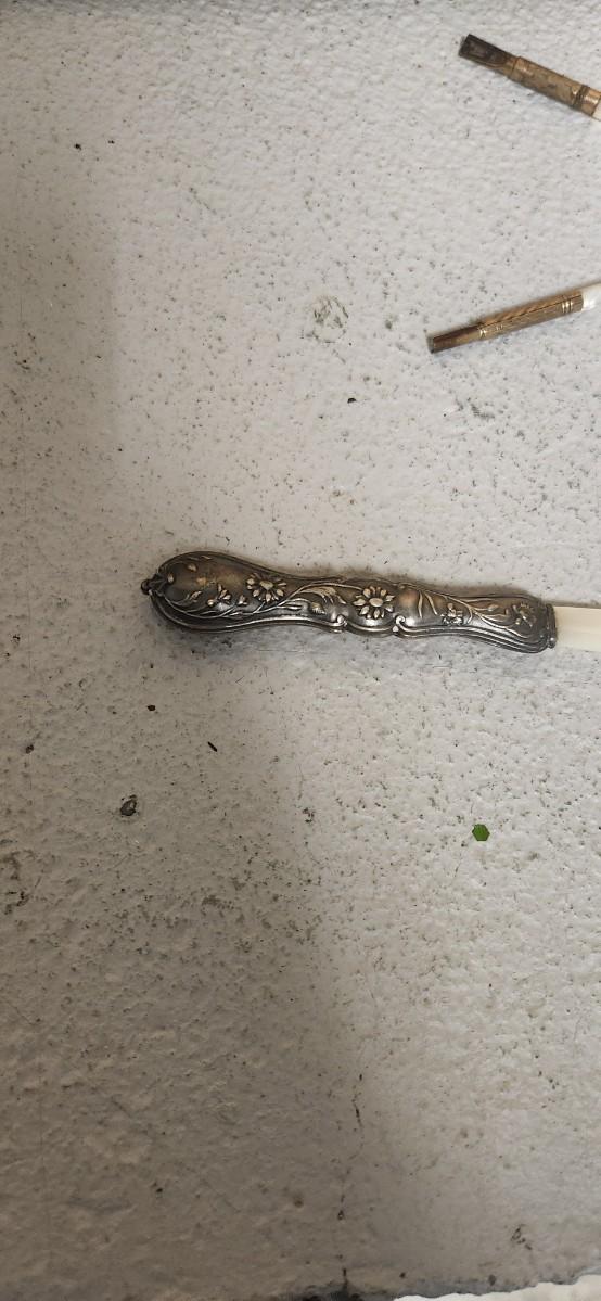 Sale Photo Thumbnail #133: Pair of ladies writing pens that are mother of pearl and gold. MoP letter opener with silver handle.
