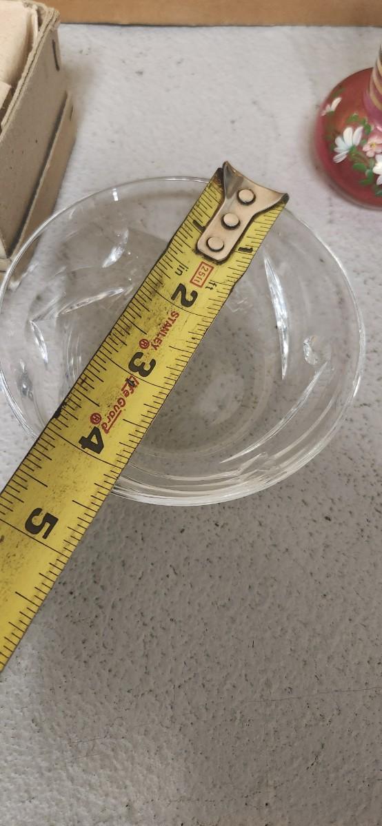 Sale Photo Thumbnail #142: Gorgeous little Baccarat finger bowl, cranberry glass small vase, pair of Waldonia crystal candlesticks and a few other things.