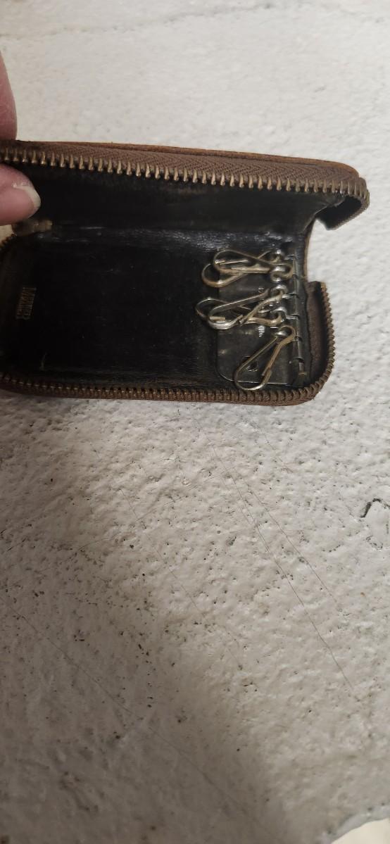 Sale Photo Thumbnail #158: Antique glasses, razors, curling iron, mirror....one of those razors have ivory on one side and what looks like tusk (?) on the other.