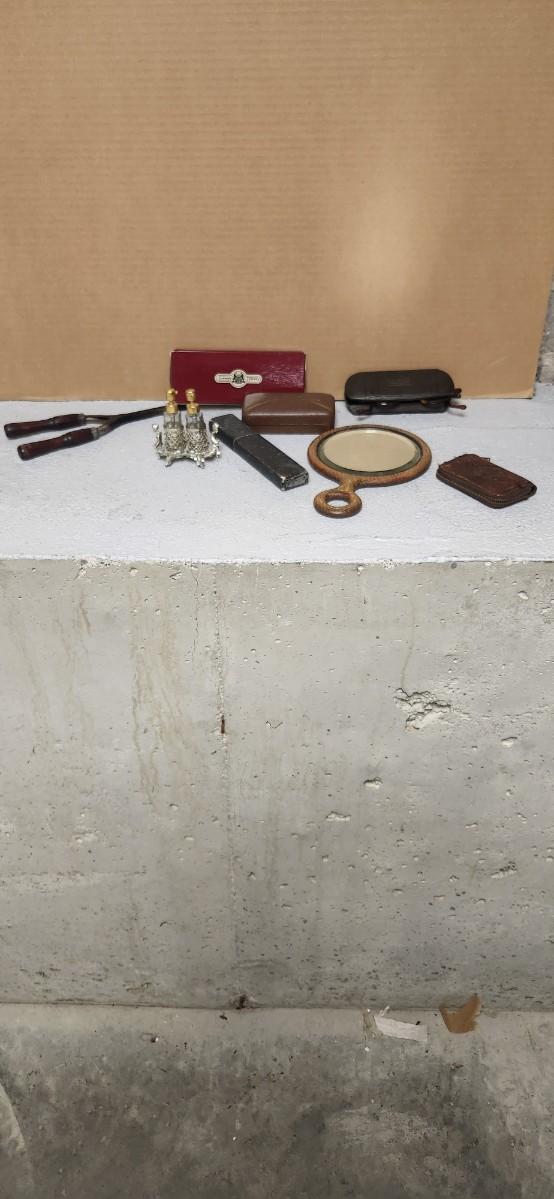 Sale Photo Thumbnail #150: Antique glasses, razors, curling iron, mirror....one of those razors have ivory on one side and what looks like tusk (?) on the other.