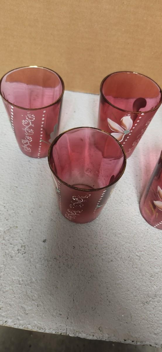 Sale Photo Thumbnail #201: Gorgeous Victorian cranberry pitcher and glasses with enamel paint. The pitcher is in excellent condition, the glasses are chippy