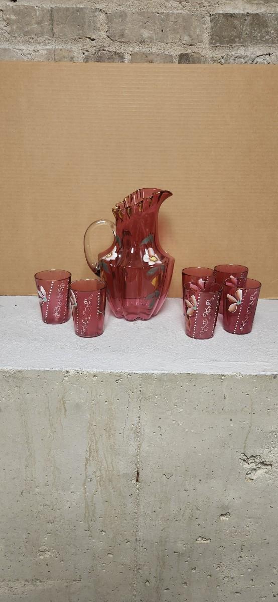 Sale Photo Thumbnail #194: Gorgeous Victorian cranberry pitcher and glasses with enamel paint. The pitcher is in excellent condition, the glasses are chippy