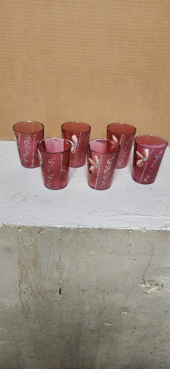 Sale Photo Thumbnail #199: Gorgeous Victorian cranberry pitcher and glasses with enamel paint. The pitcher is in excellent condition, the glasses are chippy