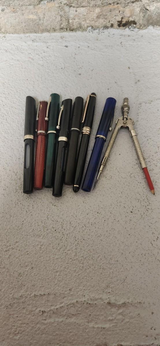 Sale Photo Thumbnail #239: Fountain pens and a protractor. Yes, I has to look up what it was called. Oof!