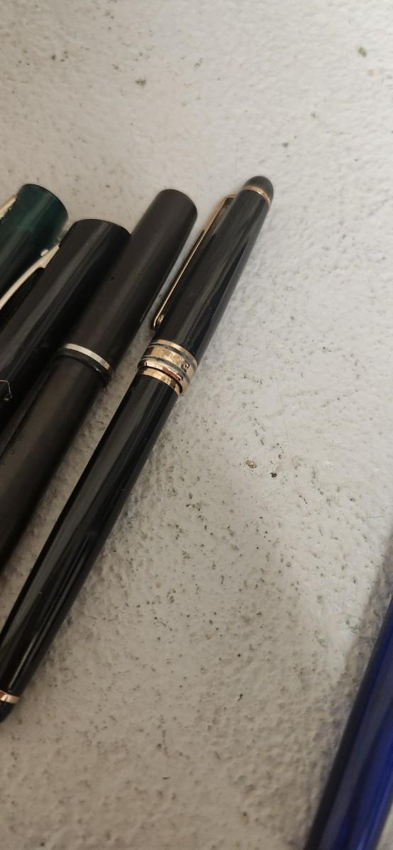 Sale Photo Thumbnail #241: Fountain pens and a protractor. Yes, I has to look up what it was called. Oof!