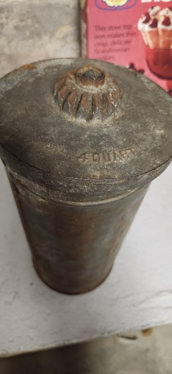 Sale Photo Thumbnail #298: Couple bean pots, a nutcracker, the inside of a big butterchurn and a krumkake iron