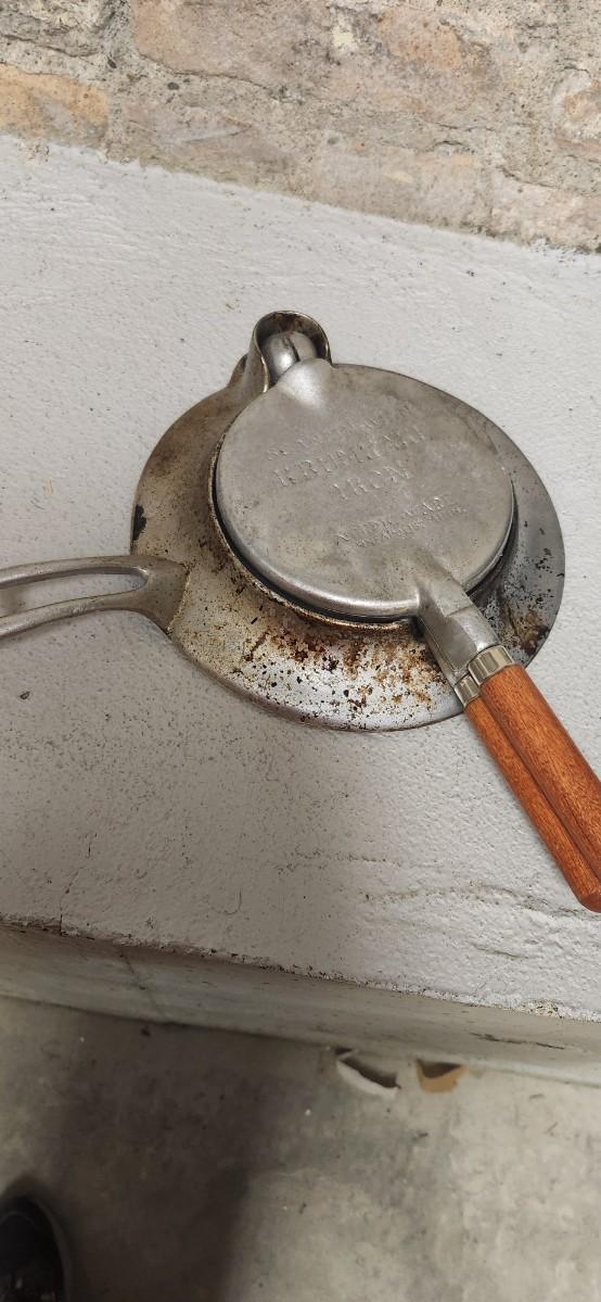 Sale Photo Thumbnail #301: Couple bean pots, a nutcracker, the inside of a big butterchurn and a krumkake iron