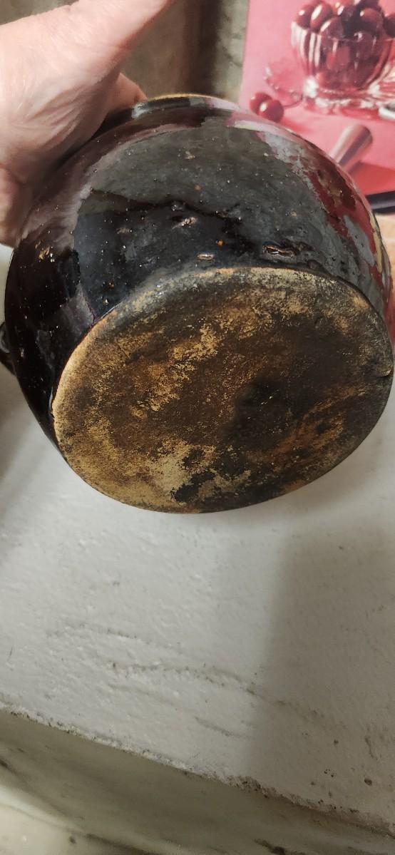 Sale Photo Thumbnail #295: Couple bean pots, a nutcracker, the inside of a big butterchurn and a krumkake iron