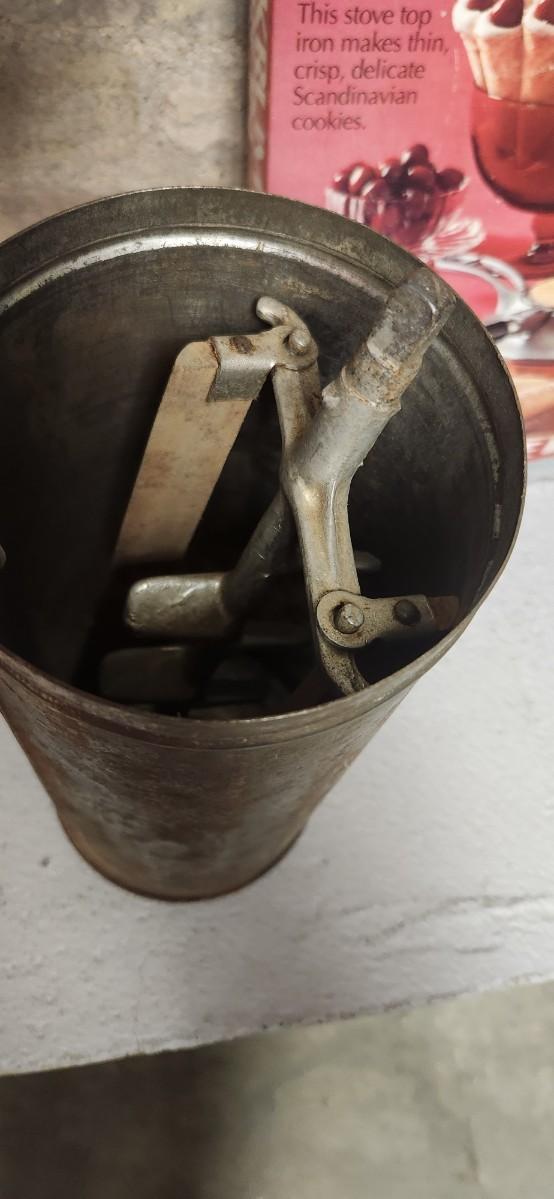 Sale Photo Thumbnail #299: Couple bean pots, a nutcracker, the inside of a big butterchurn and a krumkake iron