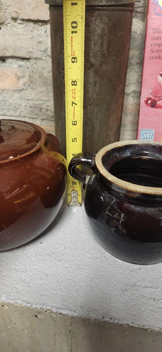 Sale Photo Thumbnail #296: Couple bean pots, a nutcracker, the inside of a big butterchurn and a krumkake iron