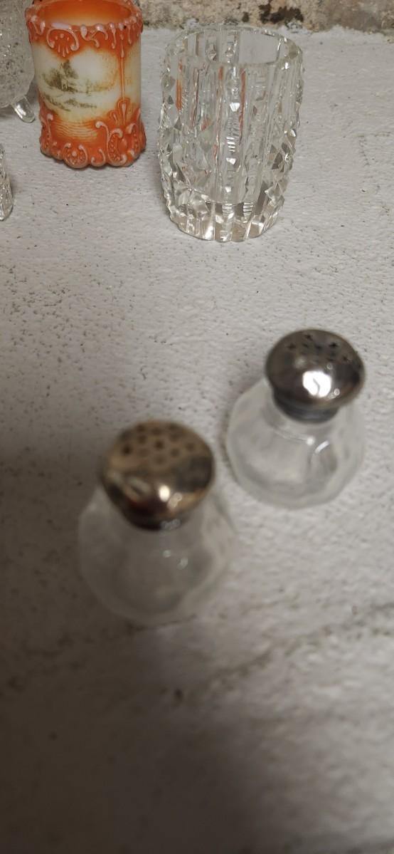 Sale Photo Thumbnail #305: Crystal toothpicks and salt cellar, a pair of antique knife rests...look at the cute shaker tops