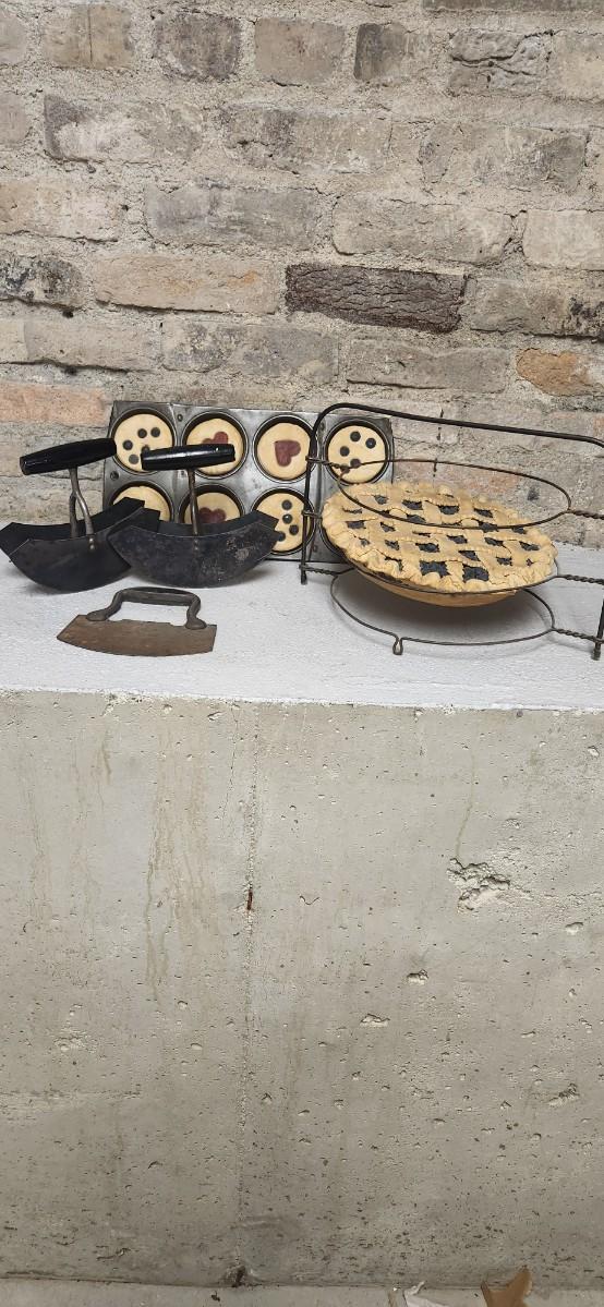 Sale Photo Thumbnail #308: Three old rocker cutters some inedible baked goods and their holders