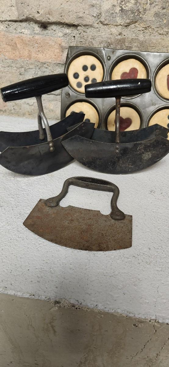 Sale Photo Thumbnail #309: Three old rocker cutters some inedible baked goods and their holders