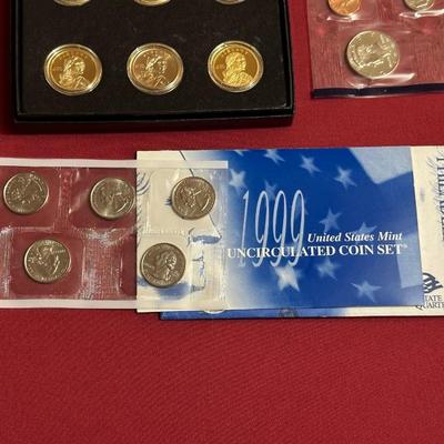 SET OF 6 SACAWAGEA DOLLAR COINS, 1999 UNCIRCULATED P-MINT QUARTERS AND COIN SET