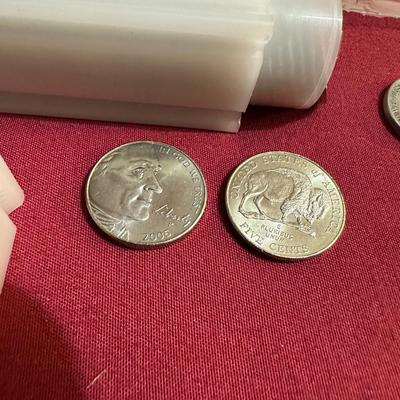COIN CONTAINER OF BUFFALO NICKELS, 2009 PENNIES, 2014 S-MINT QUARTER, 2017 QUARTER, 1943 STEEL PENNY AND 3-1940’s NICKELS