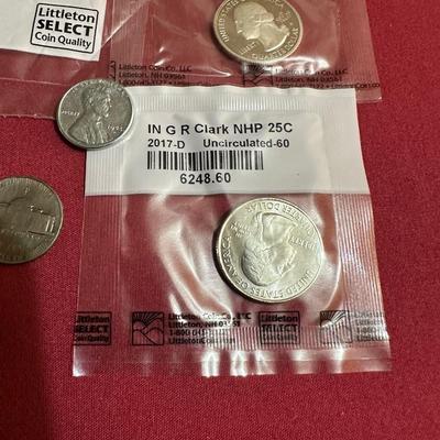 COIN CONTAINER OF BUFFALO NICKELS, 2009 PENNIES, 2014 S-MINT QUARTER, 2017 QUARTER, 1943 STEEL PENNY AND 3-1940’s NICKELS