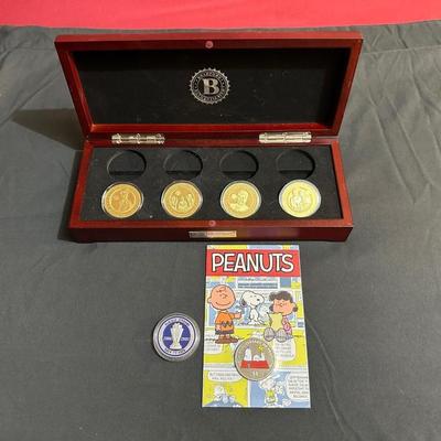 PEANUTS BRITISH VIRGIN ISLANDS $1 COIN WITH QUEEN ELIZABETH ON THE BACK SIDE, LOWES JIMMIE JOHNSON COIN AND 4 COLLECTORS COINS