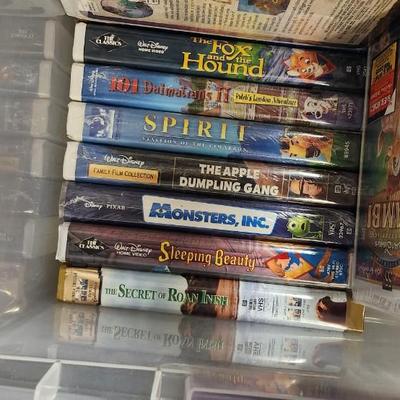 2 totes of VHS tapes