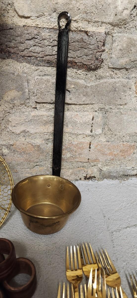 Sale Photo Thumbnail #392: Set of Golden forks, a big spider, brass dipper, wooden napkin rings and a pitcher