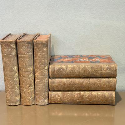 LOT 548L: Etched Brass Vase, Four Minute Essays, Ruffle Sculpture & More Books