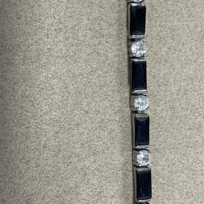 Butterfly and black accent bracelets