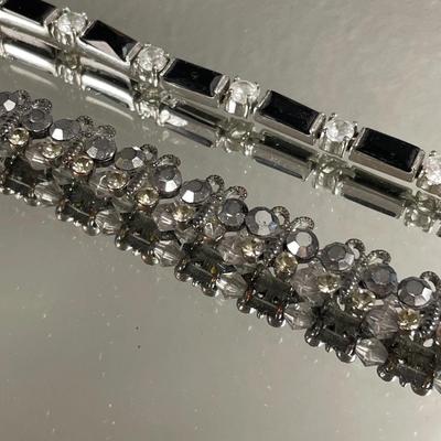 Butterfly and black accent bracelets