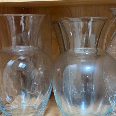LOT 568K: Cabinet of Clear Glass Vases & More