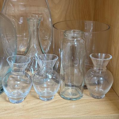 LOT 568K: Cabinet of Clear Glass Vases & More