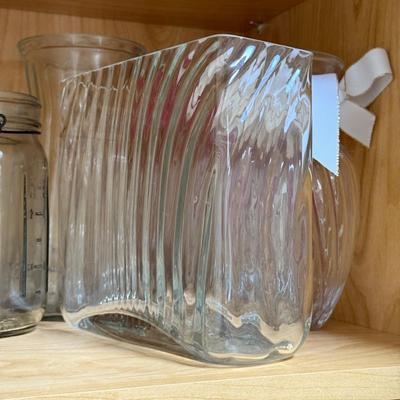 LOT 568K: Cabinet of Clear Glass Vases & More