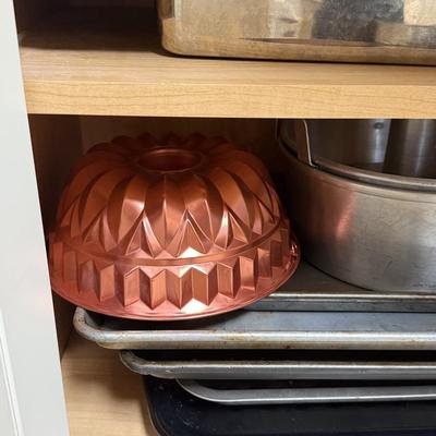 LOT 570K: Cabinet full of Baking Pans & Trays