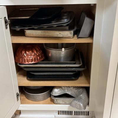 LOT 570K: Cabinet full of Baking Pans & Trays