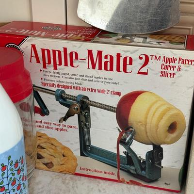 LOT 571K: Kitchen & Baking Collection: Boxed Apple Peeler, Cookie Press & Cutters, More