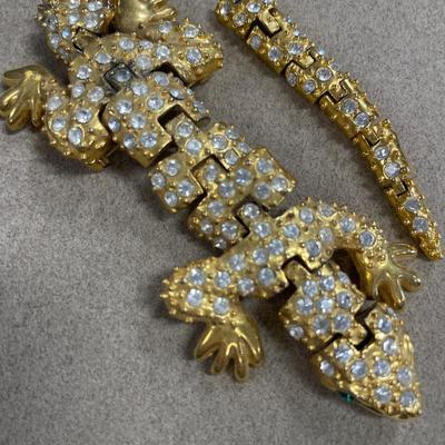 Heavily rhinestoned jewelry but all are broken/missing stones