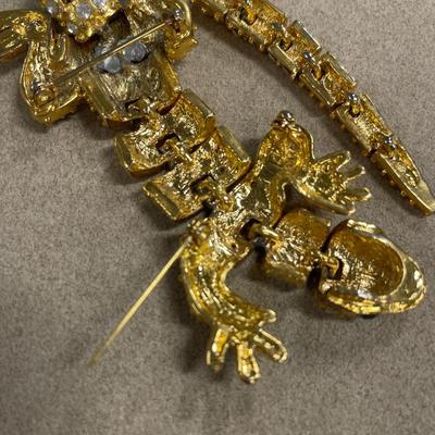 Heavily rhinestoned jewelry but all are broken/missing stones