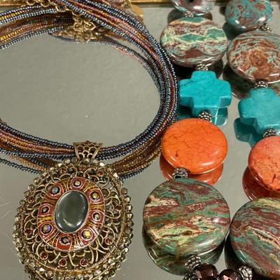 Chicos pendant necklace and large storm necklace