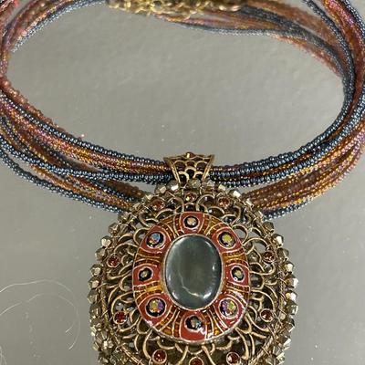 Chicos pendant necklace and large storm necklace