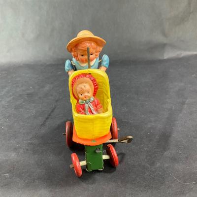 Vintage Celluloid and Tin Wind-Up | Girl and Buggy